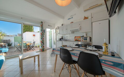Les Oyats: Furniture, Table, Property, Chair, Plant, Lighting, Orange, Wood, Interior Design, Kitchen