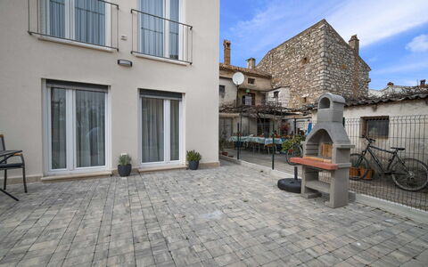Dario: Property, Town, Building, House, Cobblestone, Sky, Real Estate, Street, Architecture, Neighbourhood