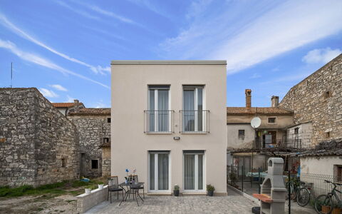 Dario: Cloud, Sky, Bicycle, Building, Window, Plant, Door, Wheel, Bicycle Wheel