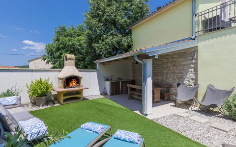 Ana: Plant, Sky, Property, Building, Shade, Architecture, Grass, Outdoor Furniture, Leisure, House