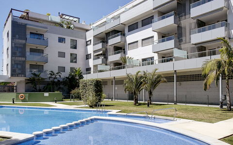 Marina Raset: Building, Property, Window, Plant, Sky, Water, Tree, Swimming Pool, Architecture, Urban Design