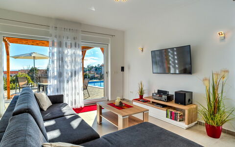 Races: Table, Picture Frame, Couch, Plant, Property, Comfort, Houseplant, Studio Couch, Interior Design, Living Room