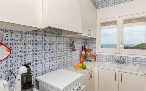 Geranis: Blue, Flooring, Floor, Interior Design, Kitchen, Major Appliance, Tile, Room, Kitchen Appliance, Cabinetry