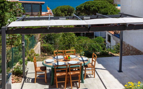 Geranis: Property, House, Building, Real Estate, Backyard, Patio, Roof, Yard, Home, Table