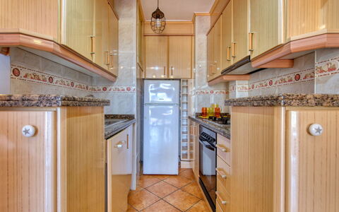 La Felicidad: Property, Room, Kitchen, Countertop, Cabinetry, Building, Real Estate, Furniture, Home, Floor