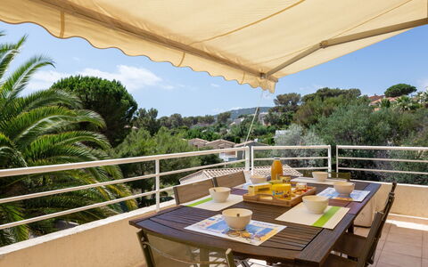 Les Mas de la Mer: Table, Furniture, Property, Building, Sky, Chair, Umbrella, Shade, Outdoor Table, Outdoor Furniture