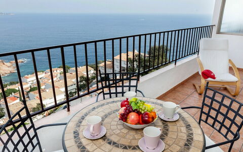 Sky Bleu Salions: Water, Sky, Building, Property, Table, Furniture, Plant, Chair, Tableware, Azure
