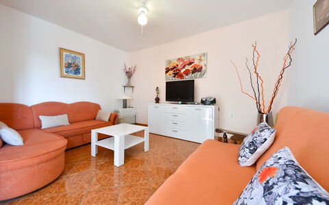 Mila: Room, Furniture, Property, Interior Design, Bedroom, Floor, Living Room, Bed, House, Orange