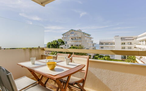 Arcachon 198: Sky, Table, Building, Daytime, Property, Furniture, Cloud, Shade, Wood, Architecture