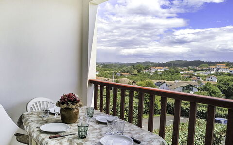 Hego Alde: Table, Plant, Cloud, Furniture, Property, Sky, Building, Window, Chair, Tableware