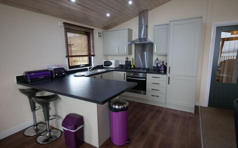 Loch Leven Lodge: Cabinetry, Furniture, Countertop, Table, Kitchen, Home Appliance, Chair, Kitchen Appliance, Wood, Interior Design