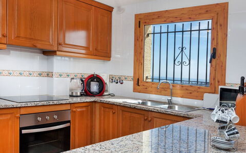 Lausanne: Countertop, Room, Kitchen, Furniture, Cabinetry, Property, Interior Design, Building, Floor, House