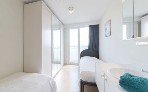 Maya - Parking and Distant View: Furniture, Window, Comfort, Building, Bed Frame, Shade, Interior Design, Wood, Floor