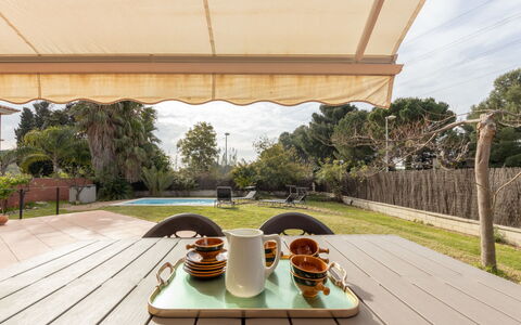 Casa Alexandra: Plant, Property, Furniture, Building, Table, Wood, Outdoor Furniture, Shade, Architecture, Tree