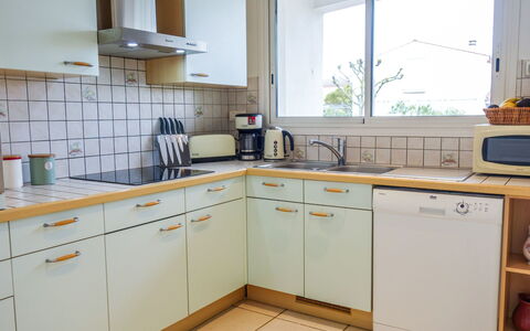 Villa Languedoc: Property, Kitchen, Room, Cabinetry, Countertop, Furniture, Yellow, Major Appliance, Building, House