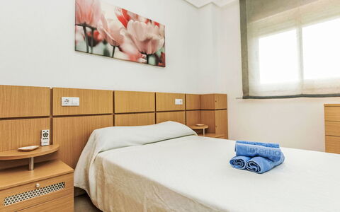 La Mar Bella: Bed, Flooring, Floor, Bedroom, Furniture, Interior Design, Bed Sheet, Room, Bedding, Ceiling