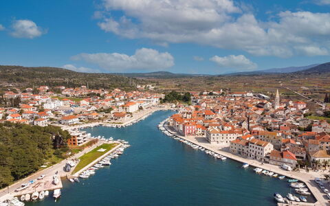 Villa Zlatan: Cloud, Water, Sky, Water Resources, Building, Boat, Azure, Infrastructure, Architecture, Coastal And Oceanic Landforms