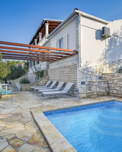 Borovina: Water, Sky, Building, Plant, Property, Swimming Pool, Azure, Window, Chair, House