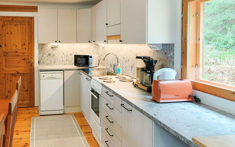 Mäntyniemi: Kitchen, Kitchen Appliance, Countertop, Major Appliance, Cabinetry, Interior Design, Wood, Flooring, Kitchen Sink, Furniture