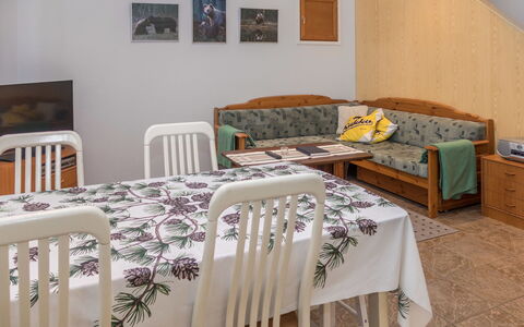 Karhunvartijan Linna B14: Furniture, Interior Design, Flooring, Wood, Floor, Room, Lighting, Table, Ceiling, Couch