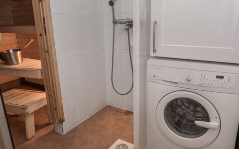 Karhunvartijan Linna B14: Flooring, Floor, Wood, Washing Machine, Interior Design, Plumbing Fixture, Laundry Room, Room, Clothes Dryer, Plumbing