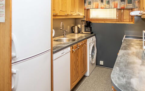 Kuusela: Wood, Flooring, Major Appliance, Floor, Kitchen, Interior Design, Furniture, Countertop, Kitchen Appliance, Room