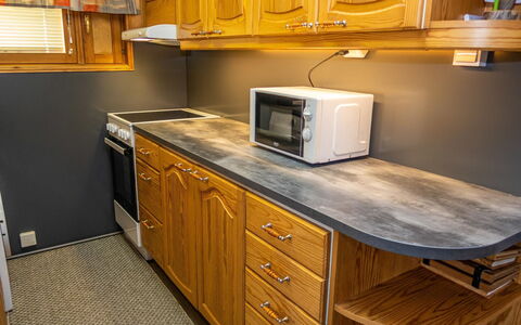 Kuusela: Wood, Flooring, Countertop, Interior Design, Floor, Furniture, Cabinetry, Kitchen Appliance, Kitchen, Room