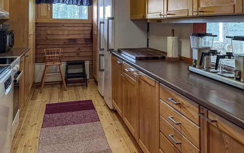 Sompsanniemi: Flooring, Wood, Countertop, Kitchen, Kitchen Appliance, Interior Design, Cabinetry, Major Appliance, Floor, Furniture