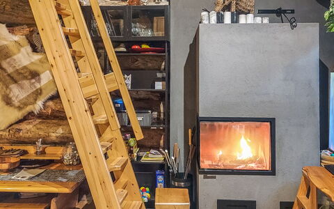 Salmikangas H2: Wood, Furniture, Hearth, Wood Stain, Natural Material, Hardwood, Chair, Wood-Burning Stove, Fireplace, Shelving
