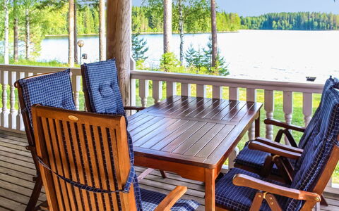Villa Hermanni: Furniture, Wood, Interior Design, Chair, Table, Flooring, Floor, Porch, Ceiling, Hardwood