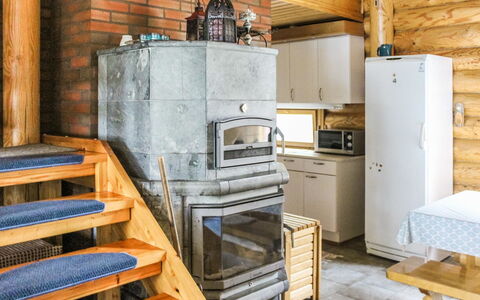 Villa Hermanni: Wood, Log Cabin, Cottage, Room, Hardwood, Wood Stain, Stove, Plank, Lumber, Kitchen