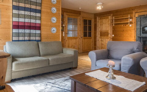 Aurora Cabin: Furniture, Interior Design, Flooring, Couch, Wood, Floor, Room, Ceiling, Living Room, Table