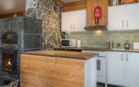Aurora Cabin: Wood, Kitchen, Countertop, Furniture, Cabinetry, Kitchen Appliance, Home, Major Appliance, Wood Stain, Sink