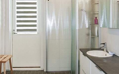 Villa Paasirinne a: Wall, Interior Design, Flooring, Floor, Plumbing Fixture, Bathroom, Ceiling, Lighting, Plumbing, Glass