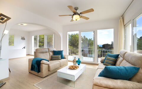 Nelli: Furniture, Property, Couch, Ceiling Fan, Green, Interior Design, Comfort, Living Room, Floor, Wood