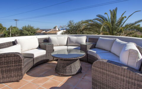 Villa del Maestro: Furniture, Wicker, Property, Coffee Table, Patio, Table, Studio Couch, Real Estate, Home, Room