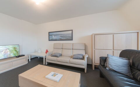 Strandhuis with Balcony: Furniture, Couch, Property, Table, Comfort, Building, Wood, Picture Frame, Interior Design, Lighting