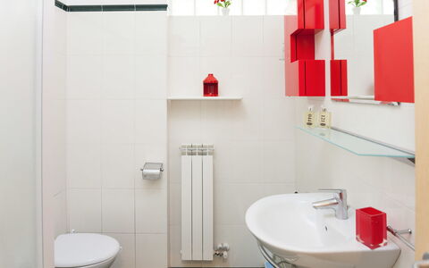Apartment Zero - Diano Marina: Bathroom, Room, Property, Red, Plumbing Fixture, Toilet, Tap, Interior Design, Bathroom Accessory, Wall