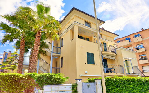 Apartment Zero - Diano Marina: Property, House, Residential Area, Home, Building, Real Estate, Architecture, Neighbourhood, Apartment, Yellow