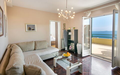 Drago: Couch, Property, Furniture, Table, Picture Frame, Lighting, Living Room, Interior Design, Floor, Wall