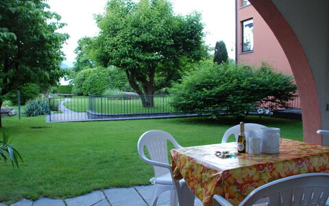 Sabrina App. 006: Property, Yard, Lawn, Grass, Backyard, Landscaping, Garden, Patio, Real Estate, Tree
