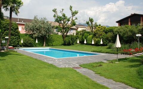 Sabrina App. 006: Swimming Pool, Property, Grass, Residential Area, Backyard, Yard, Real Estate, House, Lawn, Building