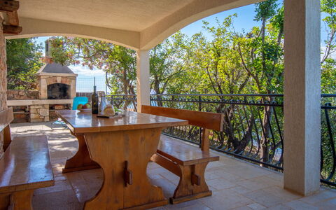 Starigrad (Senj) 100: Property, Table, Wood, Building, Shade, Architecture, Interior Design, Tree, Outdoor Furniture, Porch