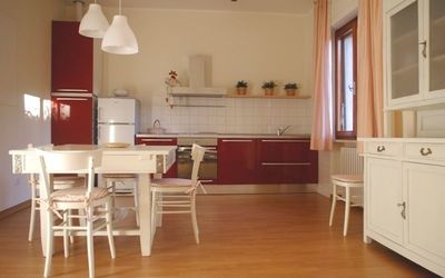 Casa Verbena: Room, Furniture, Property, Floor, Wood Flooring, Interior Design, Building, Kitchen, Hardwood, Cabinetry