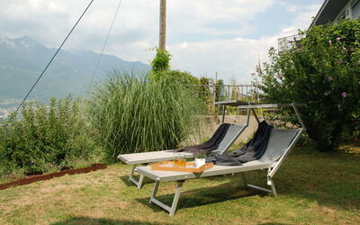 Magadino 50: Swing, Property, Furniture, Outdoor Furniture, Chair, House, Real Estate, Grass, Leisure, Yard