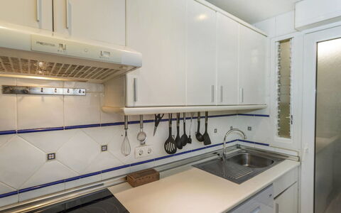 Cala Montero i: Kitchen, Countertop, Major Appliance, Kitchen Appliance, Flooring, Interior Design, Kitchen Sink, Cabinetry, Plumbing Fixture, Kitchen Stove