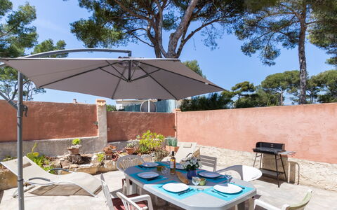 Anaisim: Table, Furniture, Sky, Plant, Building, Chair, Azure, Shade, Tree, Umbrella