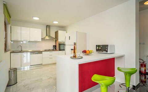 Villa Frankovići: Property, Room, Interior Design, Yellow, Furniture, Building, Kitchen, House, Real Estate, Cabinetry