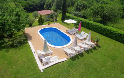 Lucija: Swimming Pool, Property, Grass, Backyard, Real Estate, House, Lawn, Leisure, Artificial Turf, Estate