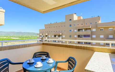 Oropesa del Mar 630: Sky, Furniture, Table, Property, Daytime, Building, Blue, Azure, Chair, Window